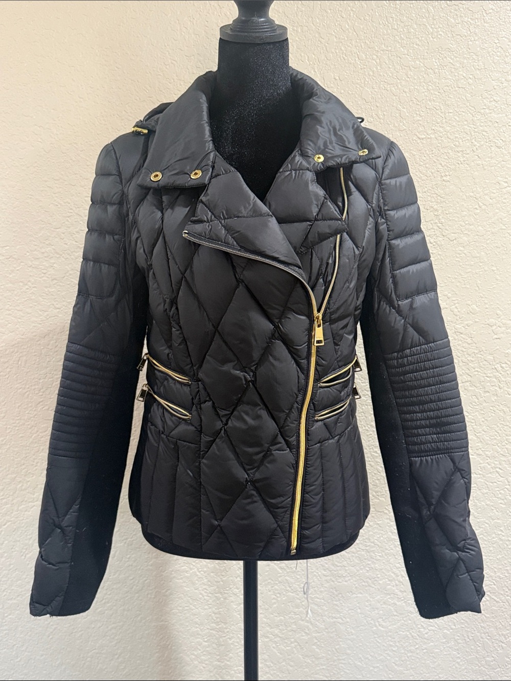 bebe Black Quilted Asymmetrical Zip Jacket with Gold Hardware.